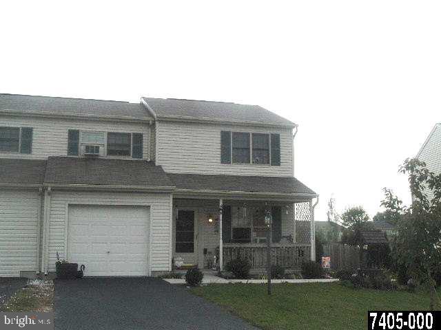 a house view with a outdoor space