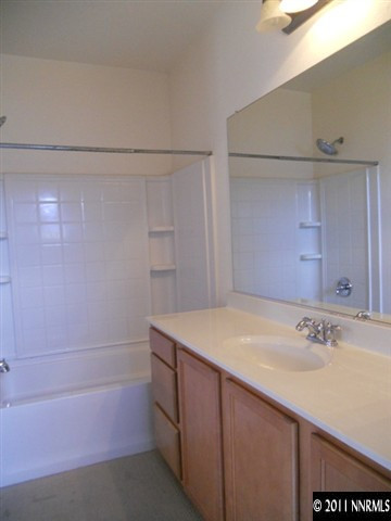 2140 Stanton Lane Reno, NV 89502 - Photo 8 of 11 a bathroom with a sink and a bathtub