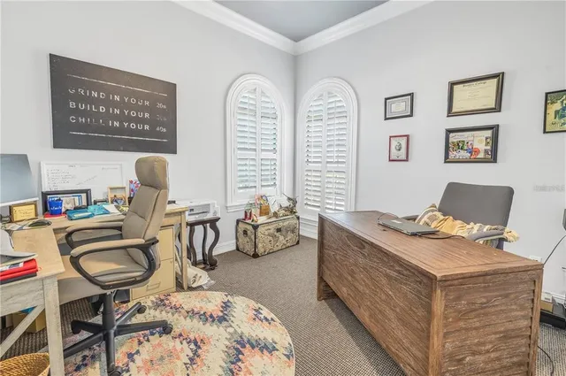 a bedroom with a bed and dresser