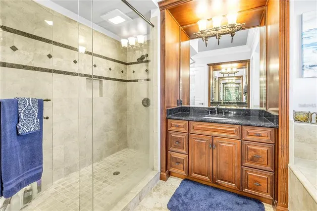 a view of a terrace with couches and wooden floor