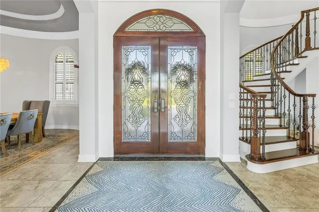 a view of an entryway with a front door