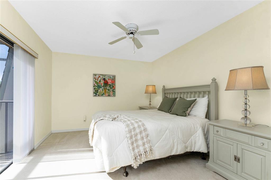 3021 Matecumbe Key Road, Unit 4 Punta Gorda, FL 33955 - Photo 30 of 42 a bedroom with a bed and a window