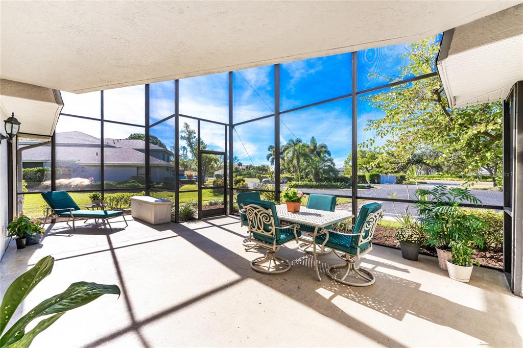 3021 Matecumbe Key Road, Unit 4 Punta Gorda, FL 33955 - Photo 3 of 42 a living room with furniture and floor to ceiling windows