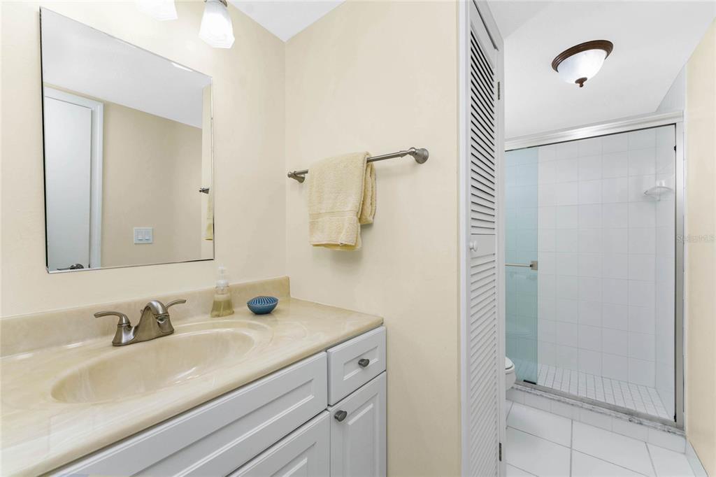 3021 Matecumbe Key Road, Unit 4 Punta Gorda, FL 33955 - Photo 32 of 42 a bathroom with a sink and a mirror