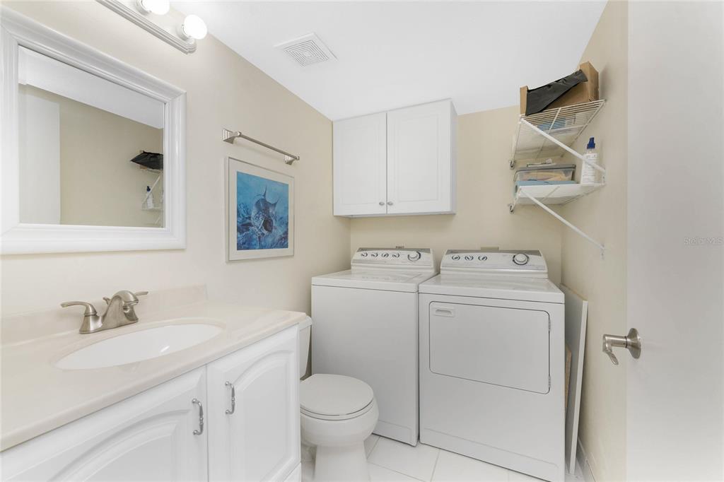 3021 Matecumbe Key Road, Unit 4 Punta Gorda, FL 33955 - Photo 33 of 42 a utility room with dryer and washer