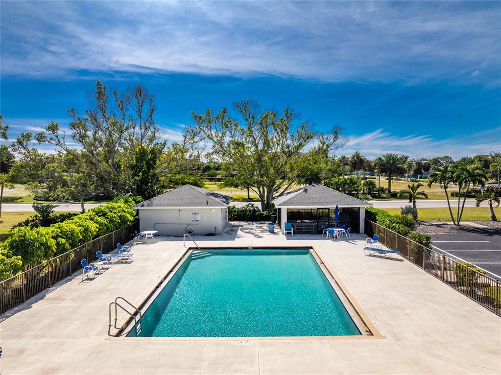 3021 Matecumbe Key Road, Unit 4 Punta Gorda, FL 33955 - Photo 38 of 42 a view of an outdoor space and a yard