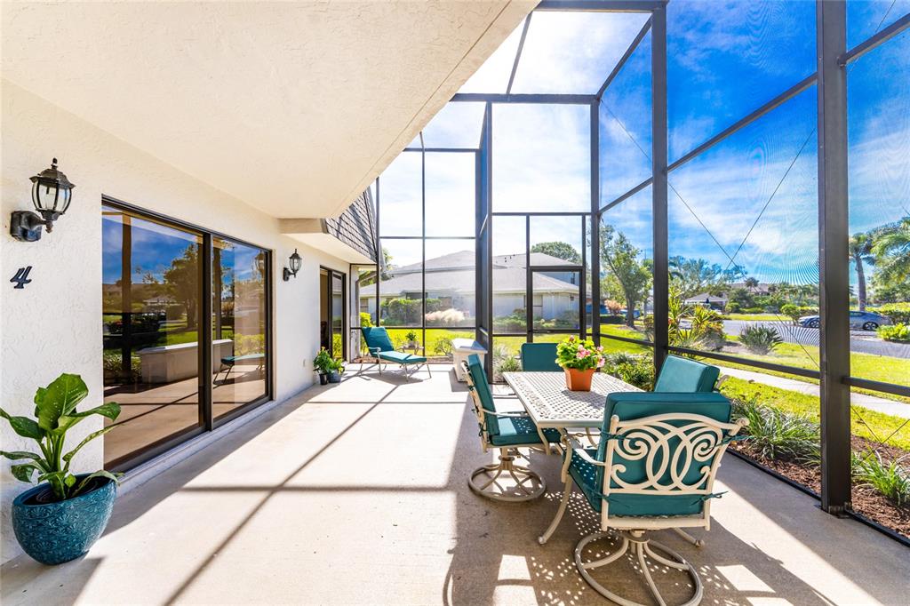 3021 Matecumbe Key Road, Unit 4 Punta Gorda, FL 33955 - Photo 4 of 42 a reading room with furniture and floor to ceiling window