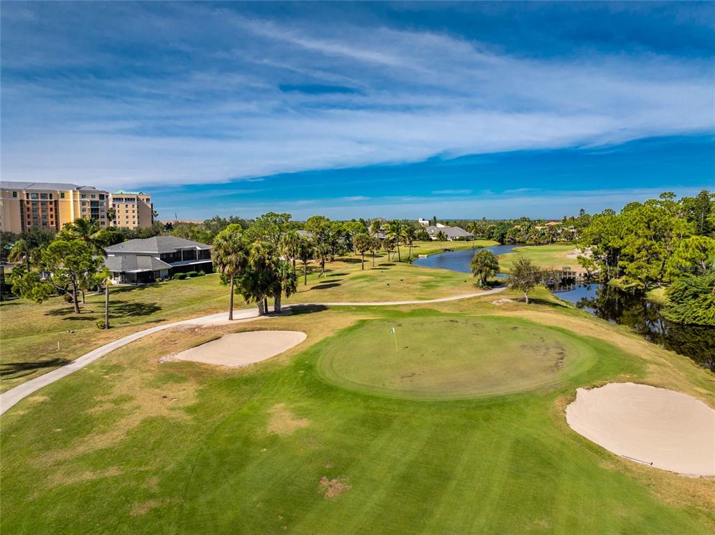 3021 Matecumbe Key Road, Unit 4 Punta Gorda, FL 33955 - Photo 41 of 42 a view of a swimming pool with an ocean view