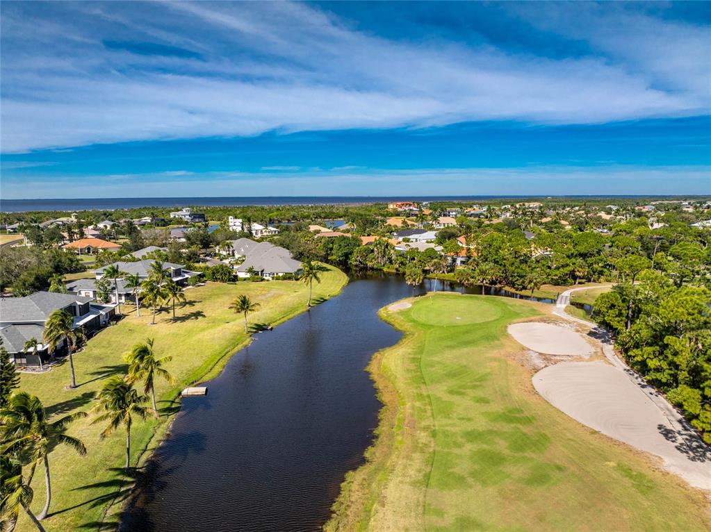 3021 Matecumbe Key Road, Unit 4 Punta Gorda, FL 33955 - Photo 42 of 42 a view of a swimming pool and an outdoor seating