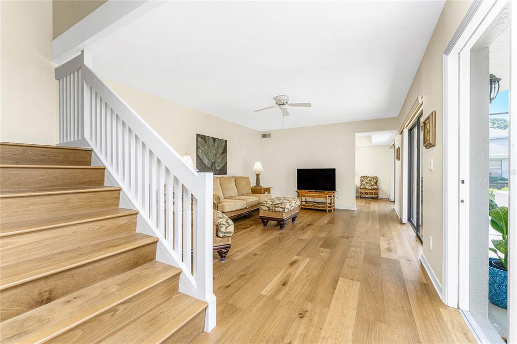 3021 Matecumbe Key Road, Unit 4 Punta Gorda, FL 33955 - Photo 9 of 42 a view of entryway and hall with wooden floor