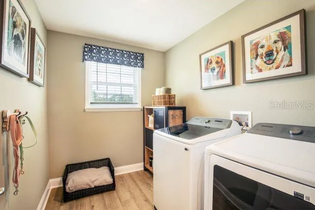 a utility room with dryer and washer
