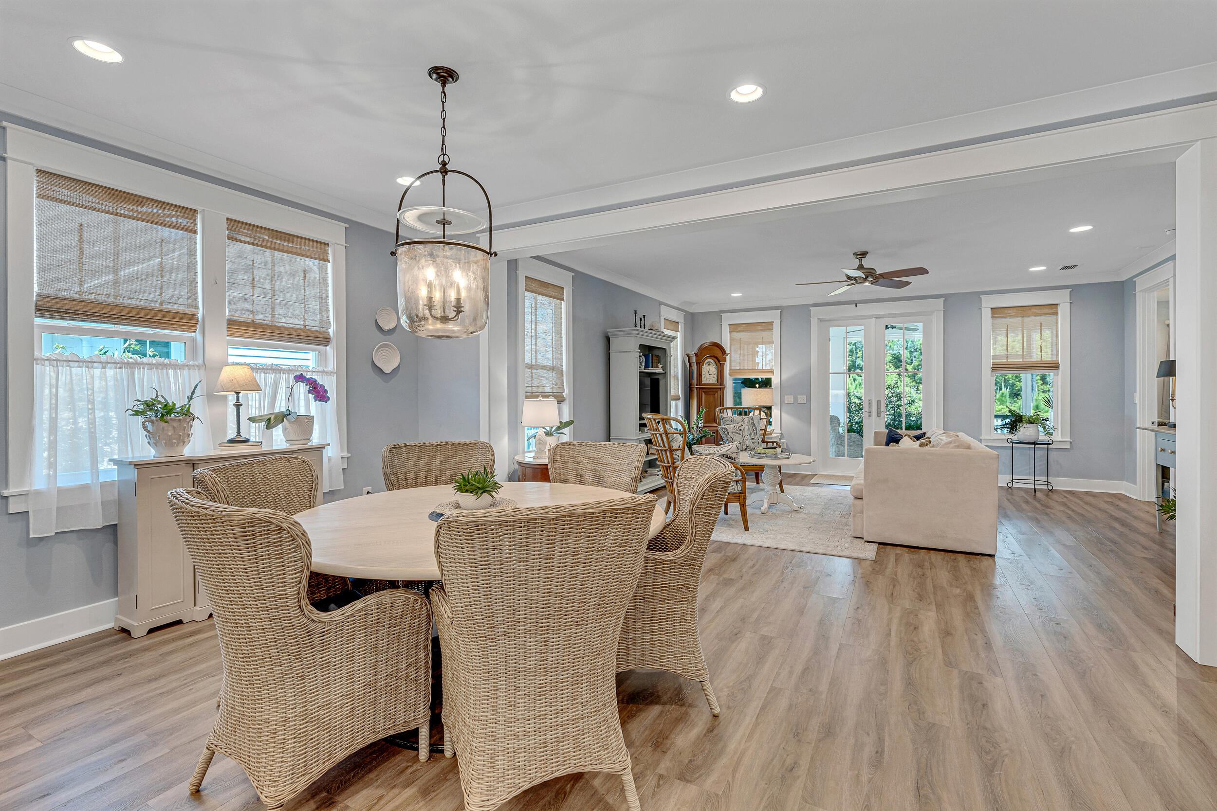 137 Sidecamp Road Watersound, FL 32461 - Photo 24 of 63 a view of a dining room with furniture window and wooden floor