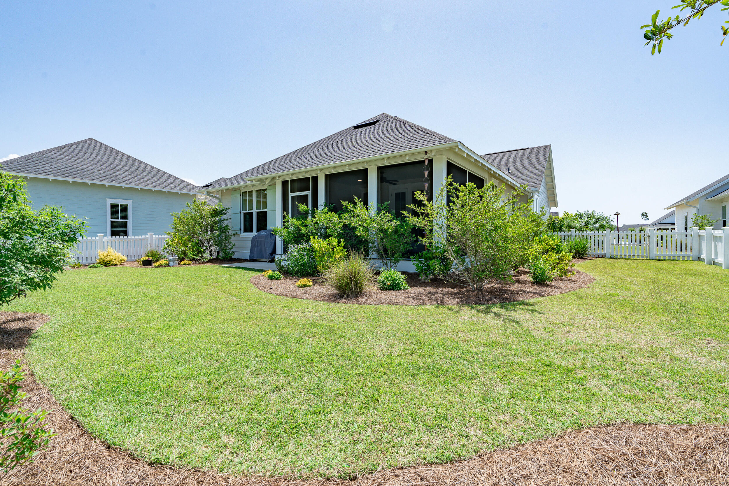 137 Sidecamp Road Watersound, FL 32461 - Photo 49 of 63 a front view of house with yard and green space