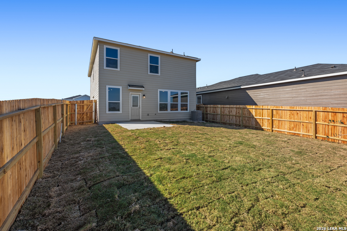 10045 Jagger Avenue Converse, TX 78109 - Photo 6 of 28 a view of a house with a backyard