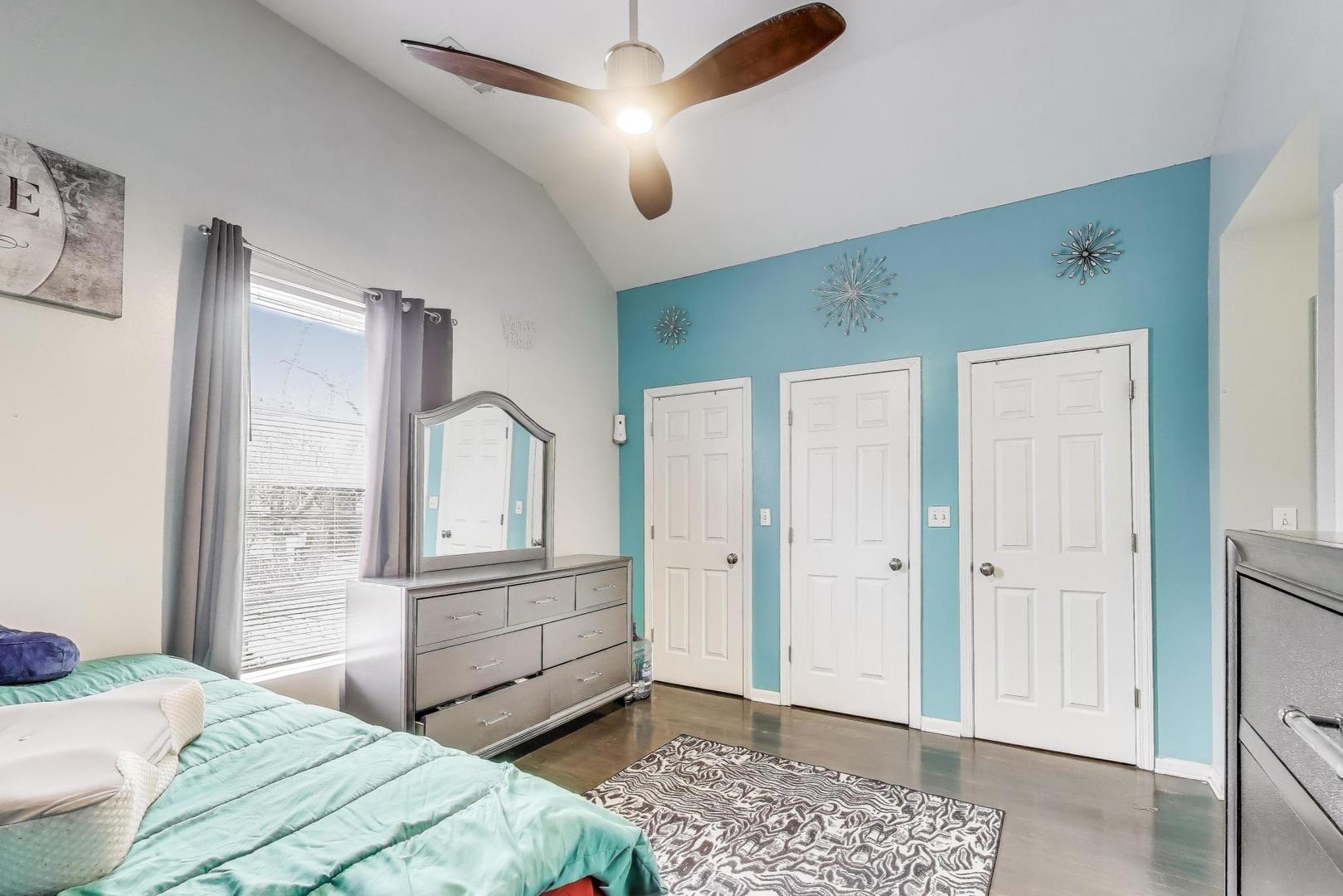 8618 South Morgan Street Chicago, IL 60620 - Photo 9 of 27 a bedroom with a bed and a dresser