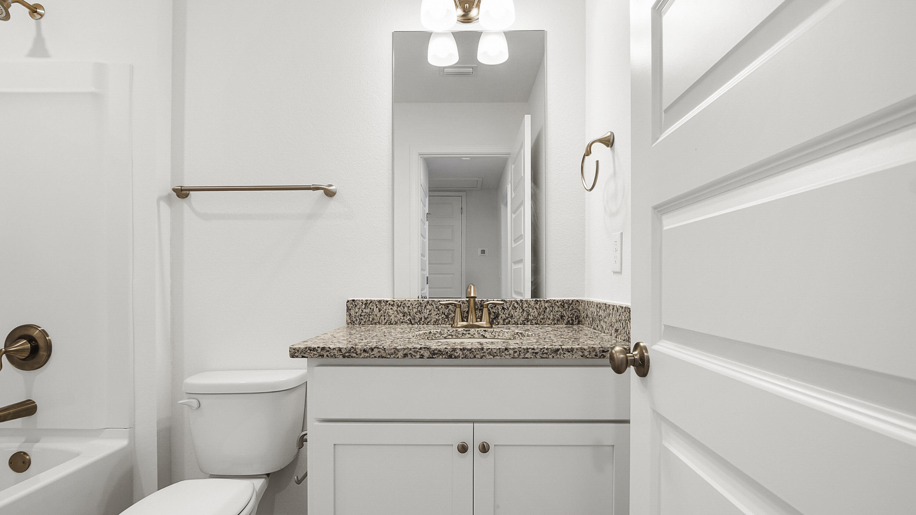 51 Phoenix Street Santa Rosa Beach, FL 32459 - Photo 27 of 34 a bathroom with a granite countertop sink toilet and shower