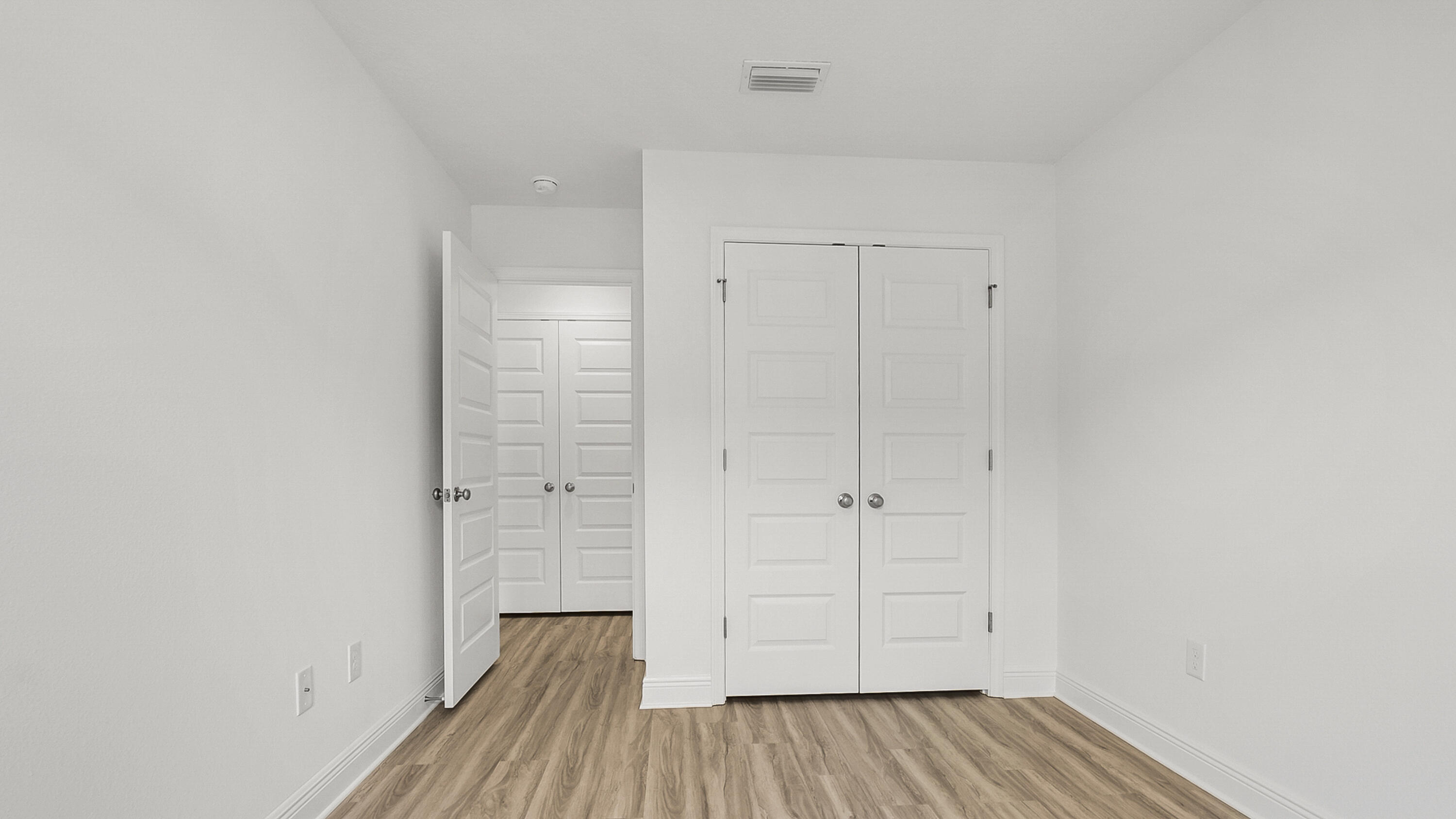 51 Phoenix Street Santa Rosa Beach, FL 32459 - Photo 31 of 34 wooden floor in an empty room