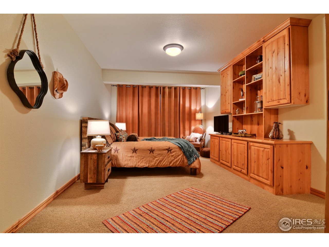 7705 Poudre River Road Greeley, CO 80634 - Photo 23 of 25 Guest Bedroom
