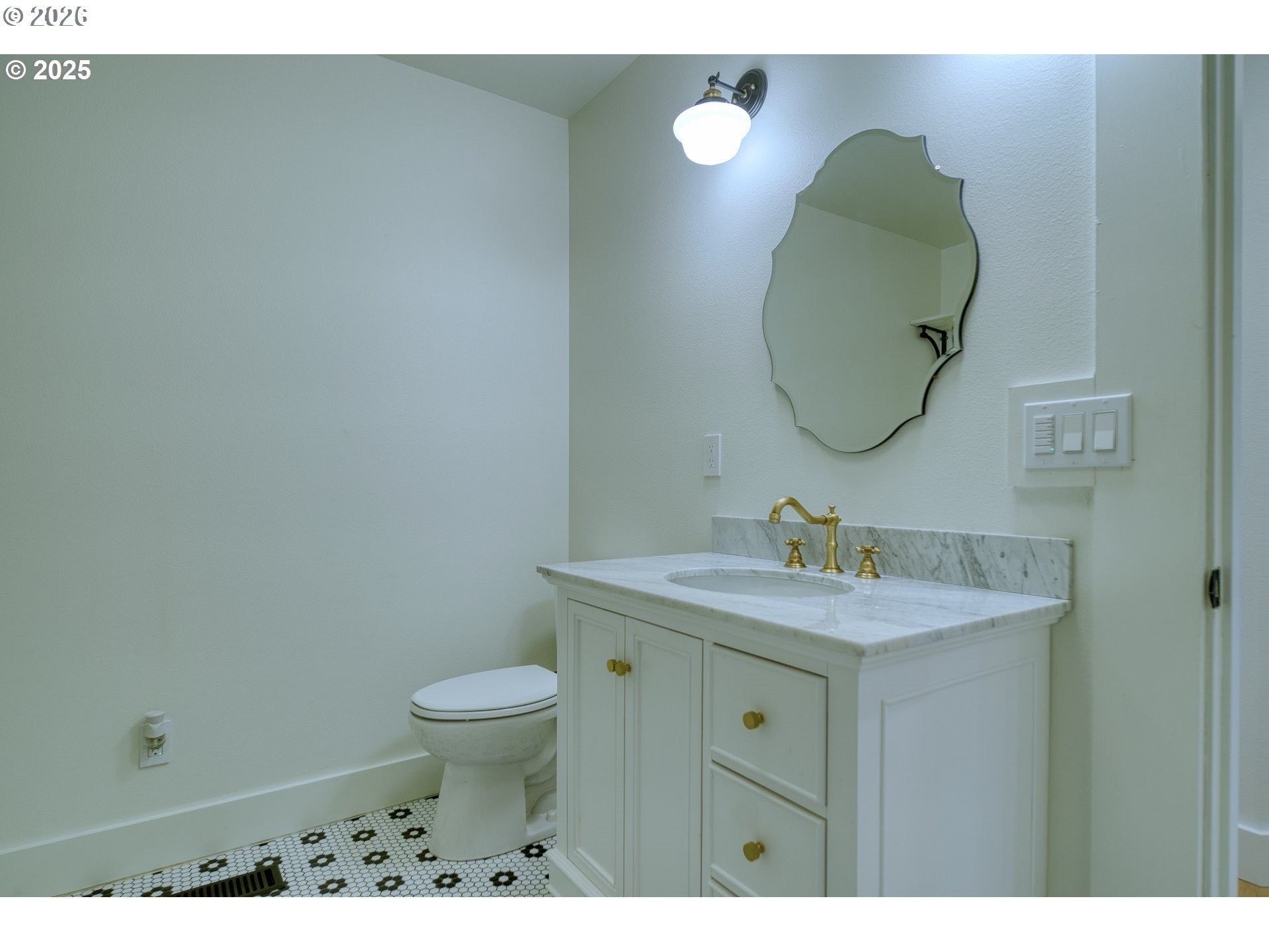 296 North 4th Street St. Helens, OR 97051 - Photo 12 of 17 a bathroom with a sink and a mirror