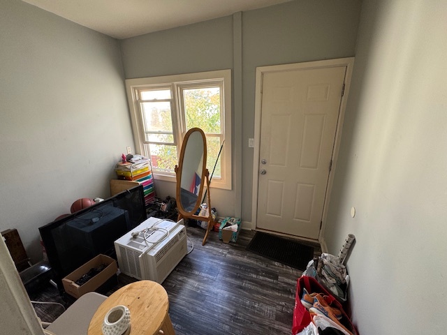 1431 North Springfield Avenue, Unit 2 Chicago, IL 60651 - Photo 15 of 19 a living room with furniture and a window