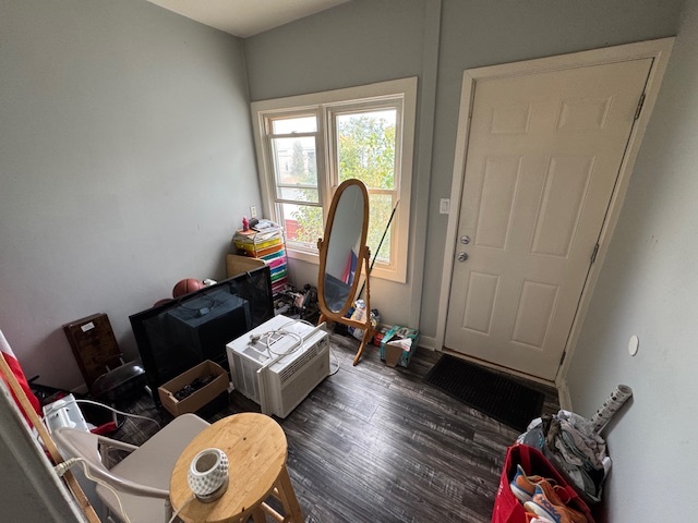 1431 North Springfield Avenue, Unit 2 Chicago, IL 60651 - Photo 16 of 19 a living room with furniture and a wooden floor