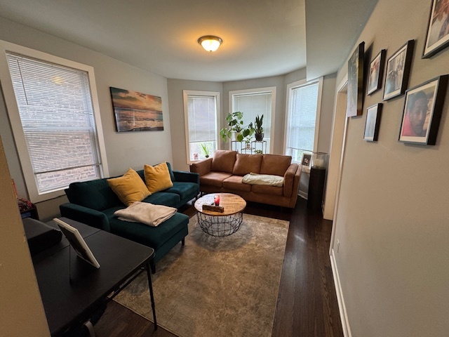 1431 North Springfield Avenue, Unit 2 Chicago, IL 60651 - Photo 2 of 19 a living room with furniture and a window