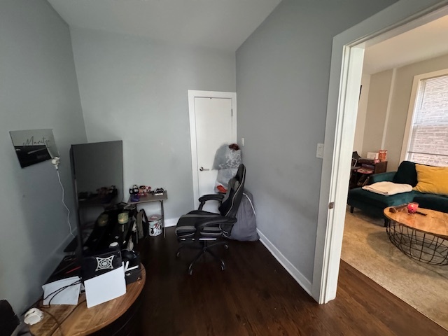 1431 North Springfield Avenue, Unit 2 Chicago, IL 60651 - Photo 6 of 19 a room with furniture and wooden floor