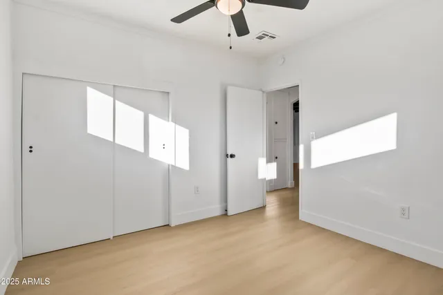 a view of staircase with wooden floor