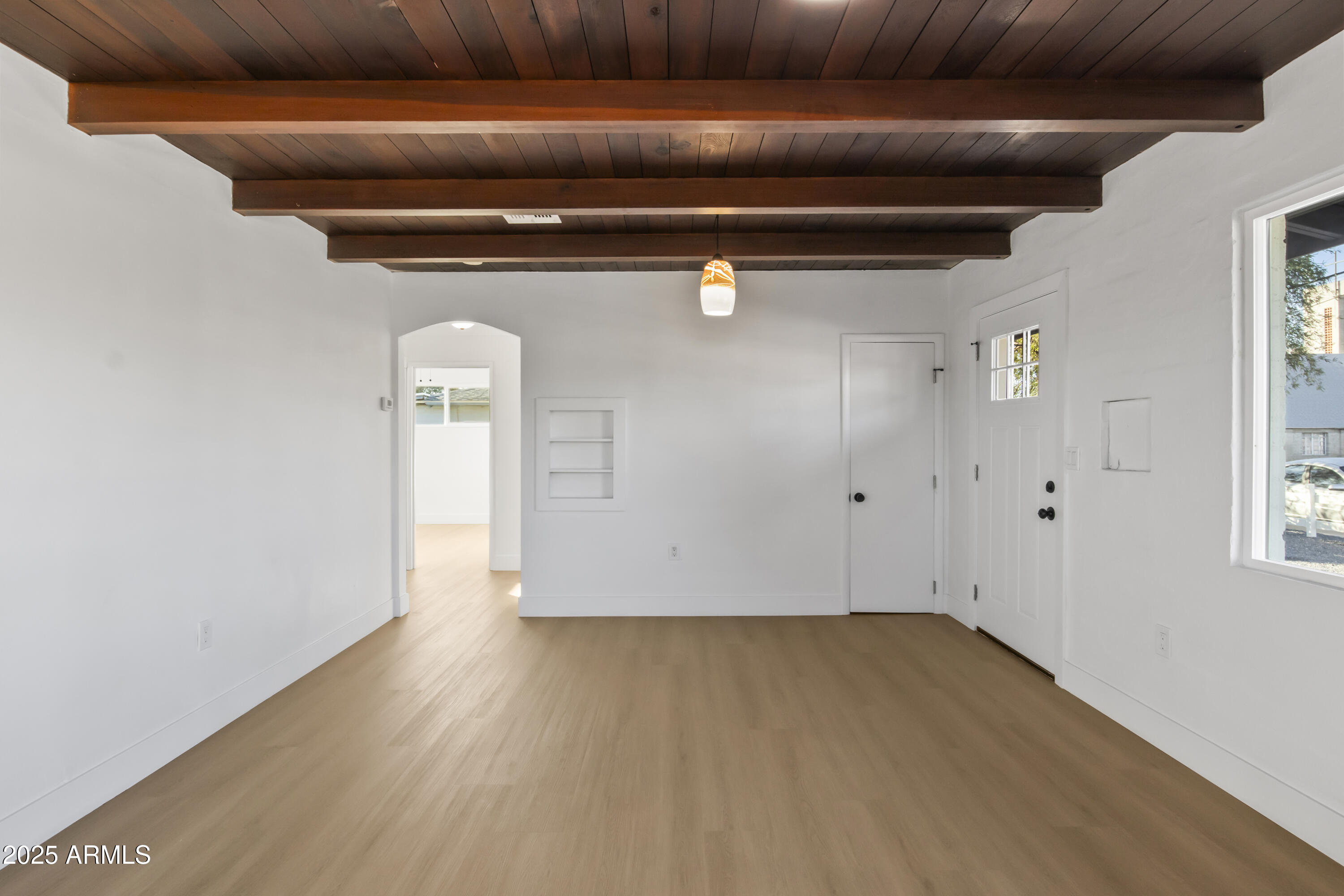 2621 North 14th Street Phoenix, AZ 85006 - Photo 27 of 36 a view of washer and dryer with wooden floor