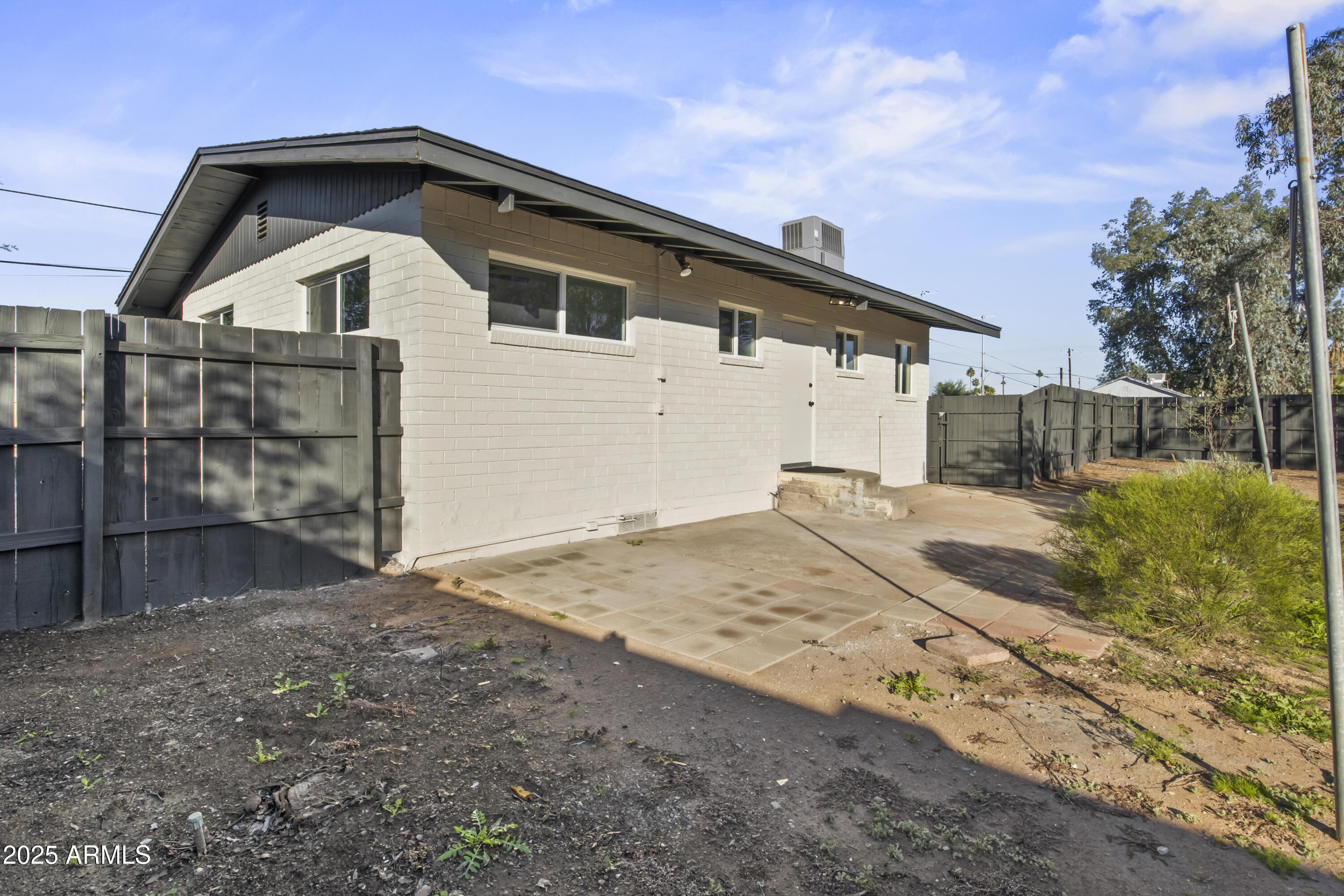 2621 North 14th Street Phoenix, AZ 85006 - Photo 29 of 36 a view of a house with a yard