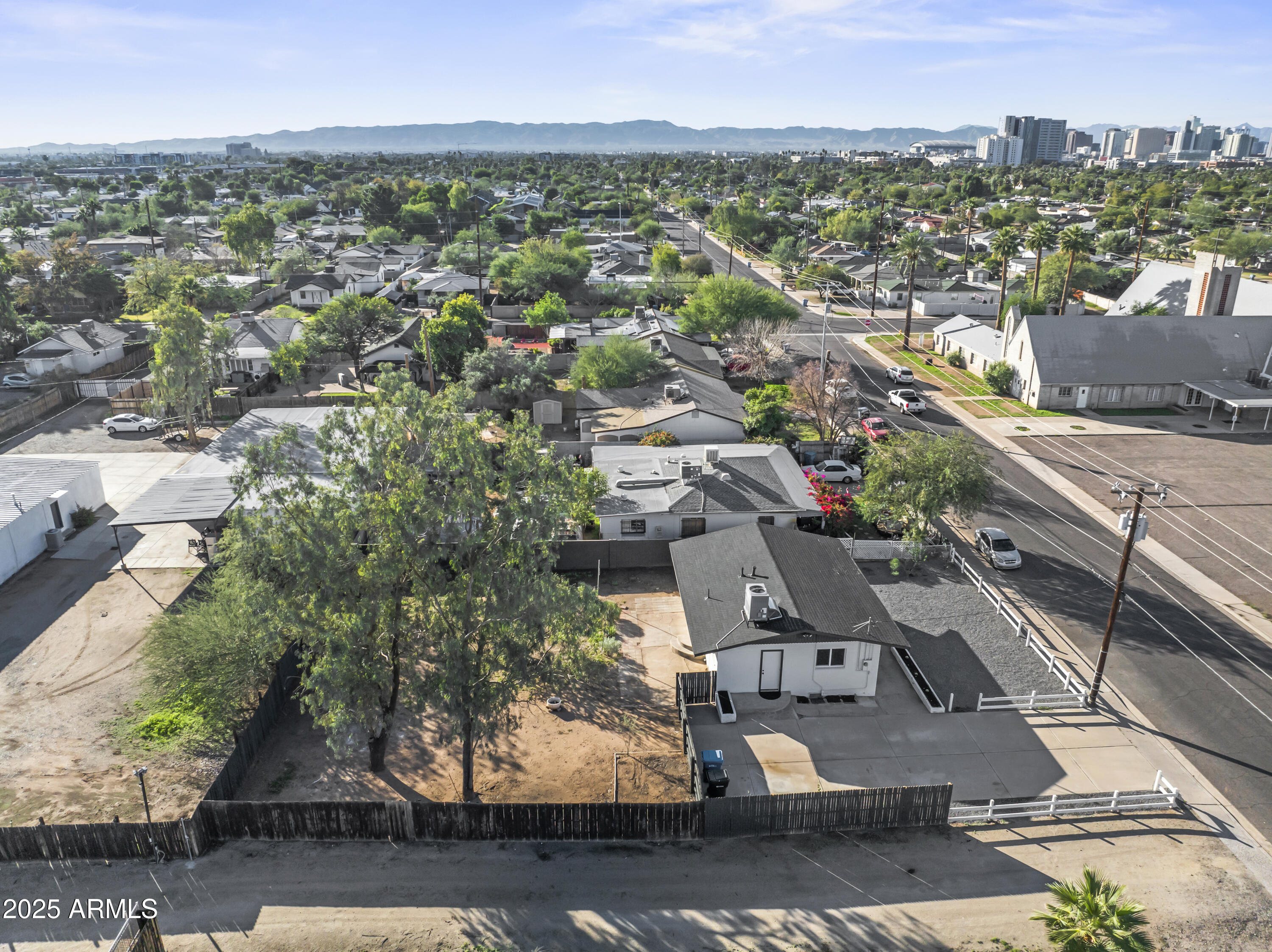2621 North 14th Street Phoenix, AZ 85006 - Photo 3 of 36 an aerial view of residential houses with outdoor space