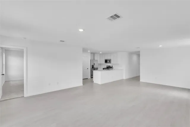 a kitchen with a sink and a window