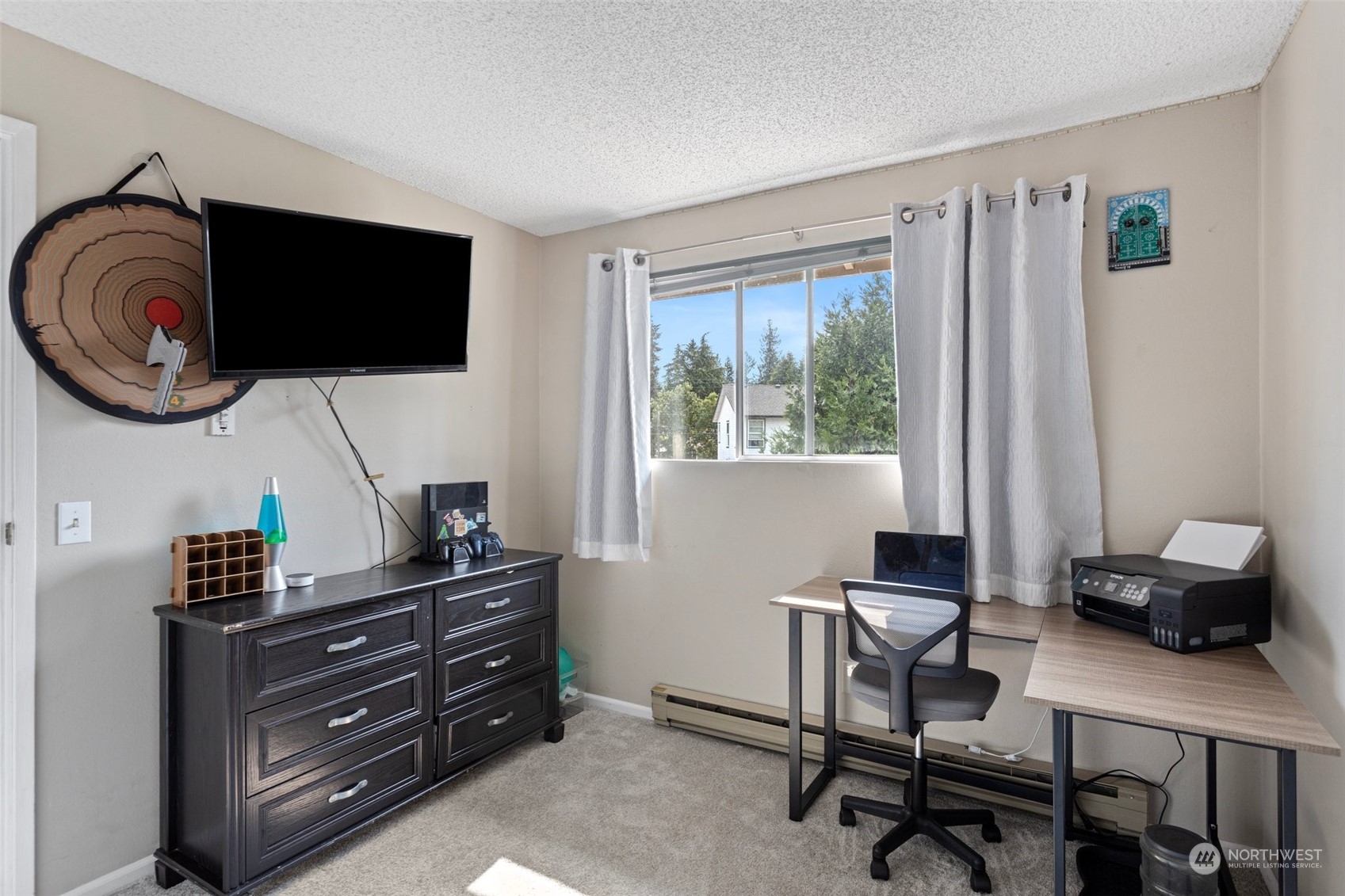 9110 Park Road, Unit 300L Edmonds, WA 98026 - Photo 17 of 27 a living room with furniture and a flat screen tv
