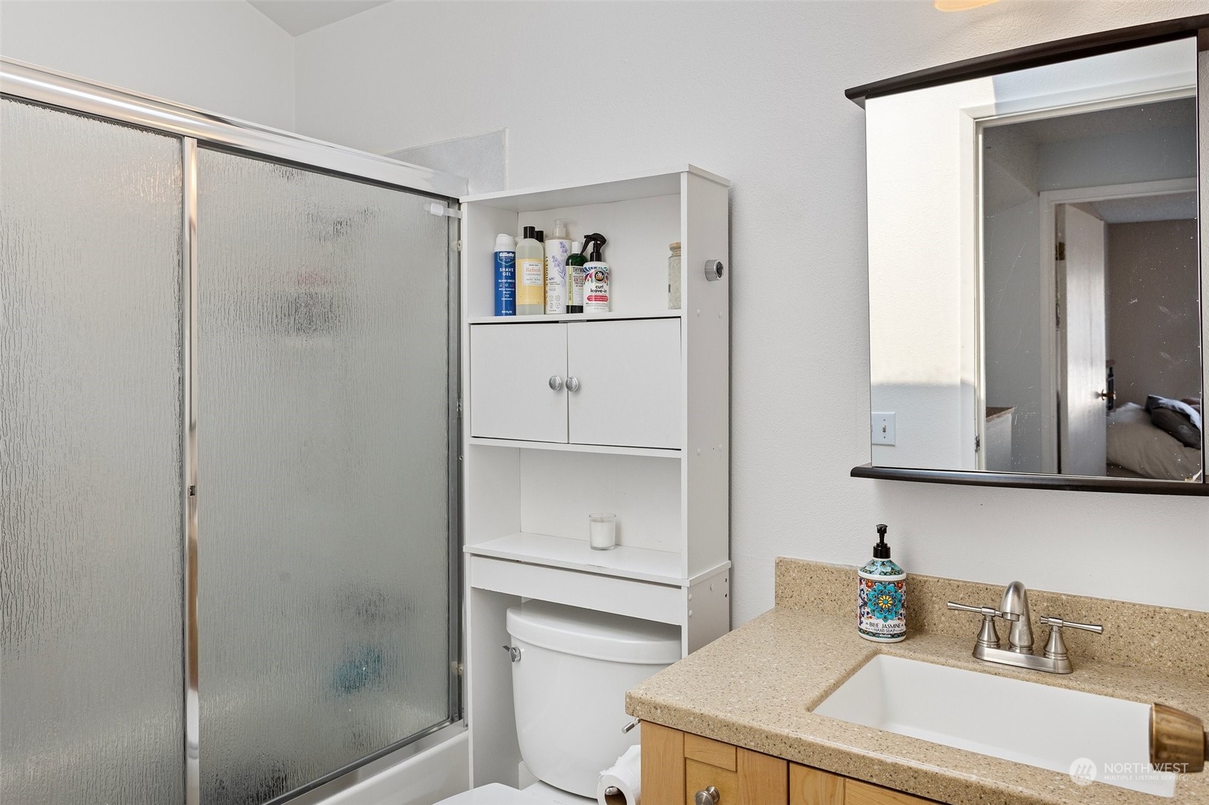 9110 Park Road, Unit 300L Edmonds, WA 98026 - Photo 18 of 27 a bathroom with a sink a toilet and shower