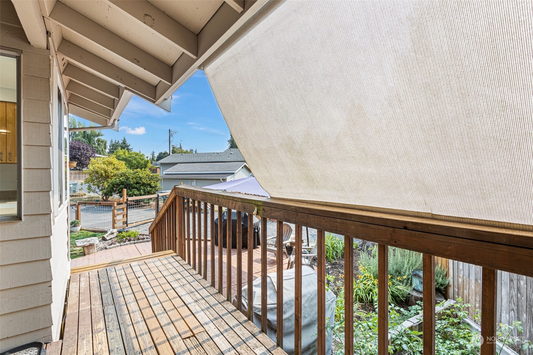 9110 Park Road, Unit 300L Edmonds, WA 98026 - Photo 19 of 27 a balcony with wooden floor