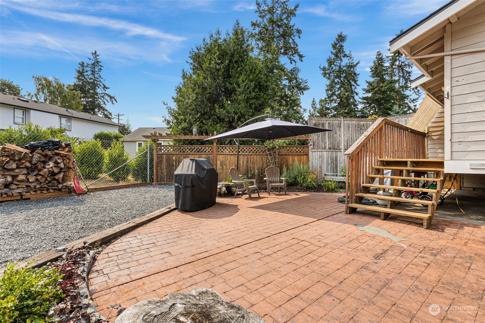 9110 Park Road, Unit 300L Edmonds, WA 98026 - Photo 22 of 27 a view of a house with backyard and sitting area