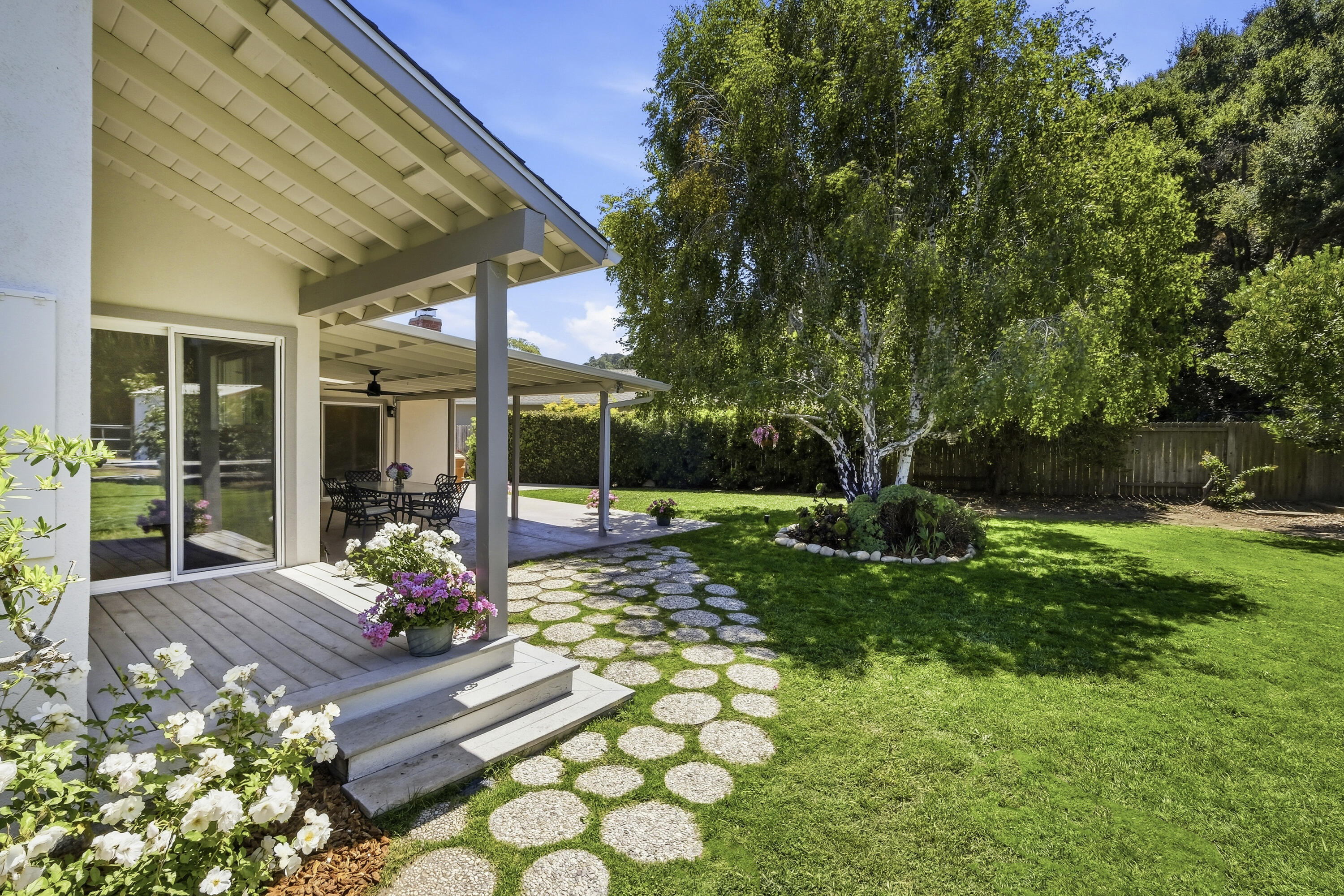 529 Via Rueda Santa Barbara, CA 93110 - Photo 9 of 34 a view of a backyard with garden and patio