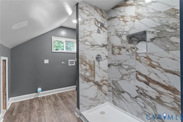 a view of a livingroom with wooden floor