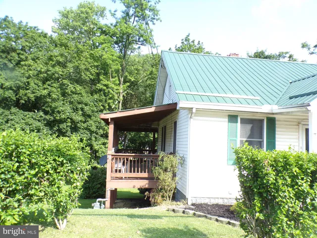 a house view with a garden space
