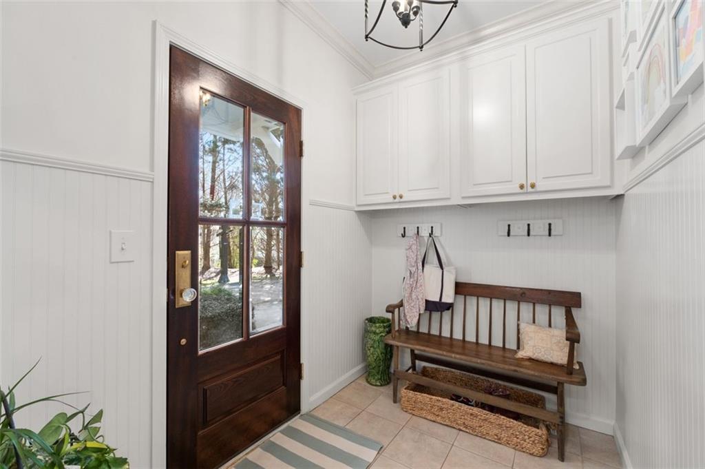 310 Glen Hampton Place Alpharetta, GA 30004 - Photo 11 of 61 a view of entryway with stairs and a window