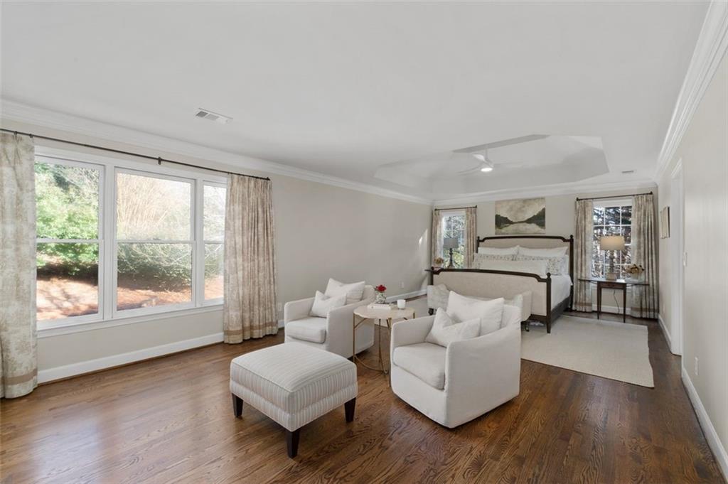 310 Glen Hampton Place Alpharetta, GA 30004 - Photo 15 of 61 a living room with furniture and a large window