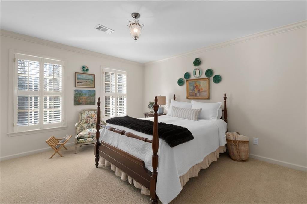 310 Glen Hampton Place Alpharetta, GA 30004 - Photo 26 of 61 a bed room with a bed and a chair
