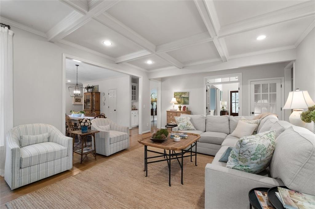 310 Glen Hampton Place Alpharetta, GA 30004 - Photo 47 of 61 a living room with furniture and wooden floor