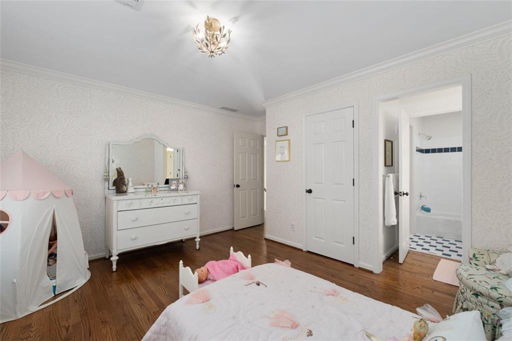 310 Glen Hampton Place Alpharetta, GA 30004 - Photo 58 of 61 a bed room with a bed and a window