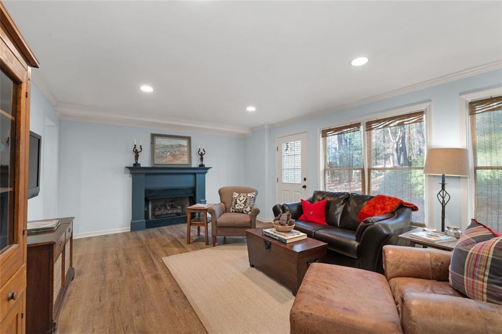 310 Glen Hampton Place Alpharetta, GA 30004 - Photo 61 of 61 a living room with furniture and a couch