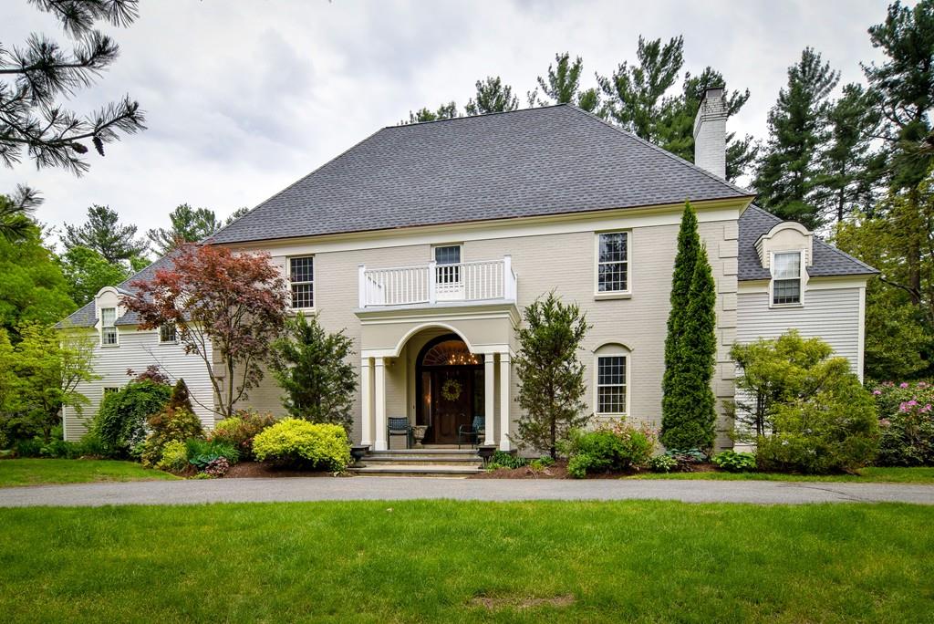 104 Fox Run Road Sudbury, MA 01776 - Photo 1 of 36 a front view of a house with a garden