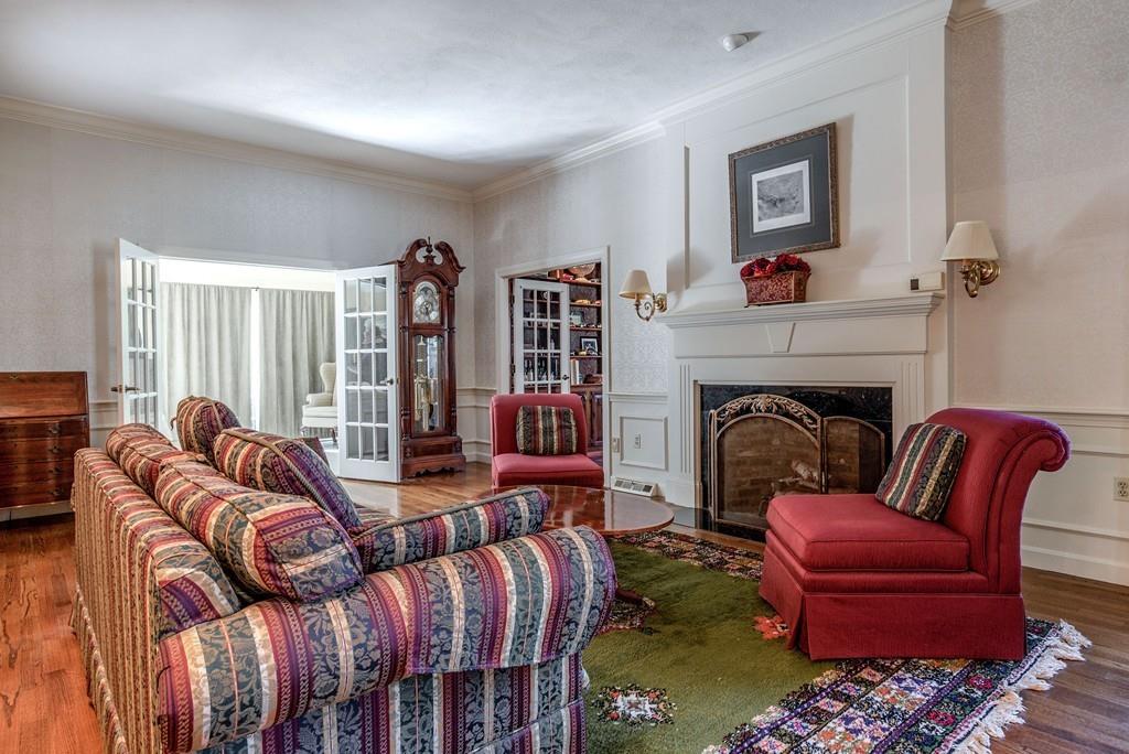 104 Fox Run Road Sudbury, MA 01776 - Photo 17 of 36 a living room with furniture fireplace and rug