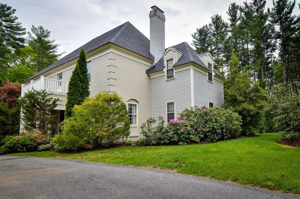 104 Fox Run Road Sudbury, MA 01776 - Photo 31 of 36 a view of a house with a yard and plants