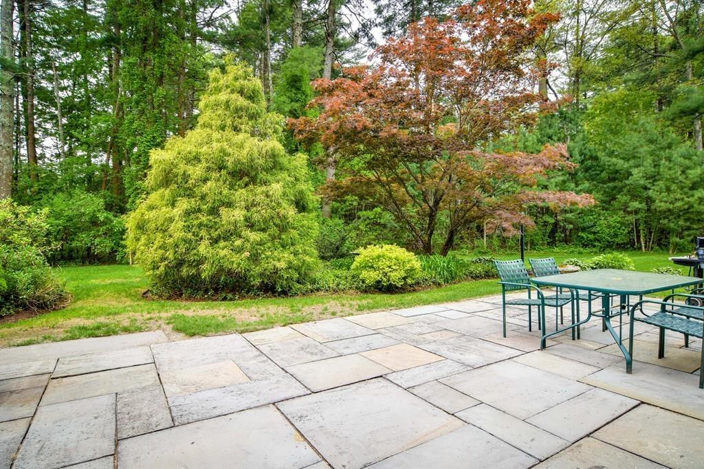 104 Fox Run Road Sudbury, MA 01776 - Photo 33 of 36 a view of backyard with seating and green space