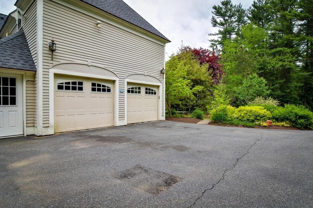 104 Fox Run Road Sudbury, MA 01776 - Photo 34 of 36 a view of a house with a garage